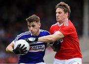 6 July 2019; Trevor Collins of Laois in action against Liam O'Donovan of Cork during the GAA Football All-Ireland Senior Championship Round 4 match between Cork and Laois at Semple Stadium in Thurles, Tipperary. Photo by Matt Browne/Sportsfile