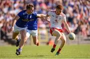 6 July 2019; Cathal McShane of Tyrone in action against Pádraig Faulkner of Cavan during the GAA Football All-Ireland Senior Championship Round 4 match between Cavan and Tyrone at St. Tiernach's Park in Clones, Monaghan. Photo by Ben McShane/Sportsfile