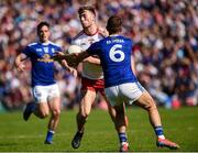 6 July 2019; Brian Kennedy of Tyrone in action against Killian Clarke of Cavan during the GAA Football All-Ireland Senior Championship Round 4 match between Cavan and Tyrone at St.Tiernach's Park in Clones, Monaghan. Photo by Oliver McVeigh/Sportsfile