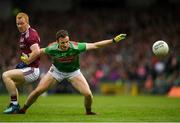 6 July 2019; Darren Coen of Mayo in action against Declan Kyne of Galway during the GAA Football All-Ireland Senior Championship Round 4 match between Galway and Mayo at the LIT Gaelic Grounds in Limerick. Photo by Eóin Noonan/Sportsfile