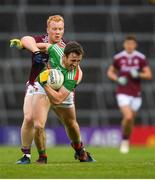 6 July 2019; Darren Coen of Mayo in action against Declan Kyne of Galway during the GAA Football All-Ireland Senior Championship Round 4 match between Galway and Mayo at the LIT Gaelic Grounds in Limerick. Photo by Eóin Noonan/Sportsfile