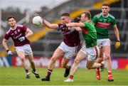 6 July 2019; Eamonn Brannigan of Galway is tackled by Colm Boyle of Mayo during the GAA Football All-Ireland Senior Championship Round 4 match between Galway and Mayo at the LIT Gaelic Grounds in Limerick. Photo by Brendan Moran/Sportsfile