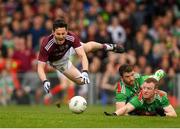 6 July 2019; Ian Burke of Galway is fouled by Chris Barrett of Mayo resulting in a penalty during the GAA Football All-Ireland Senior Championship Round 4 match between Galway and Mayo at the LIT Gaelic Grounds in Limerick. Photo by Eóin Noonan/Sportsfile