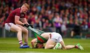 6 July 2019; Sean Andy Ó Ceallaigh of Galway pulls the jersey of Colm Boyle of Mayo during the GAA Football All-Ireland Senior Championship Round 4 match between Galway and Mayo at the LIT Gaelic Grounds in Limerick. Photo by Brendan Moran/Sportsfile