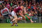 6 July 2019; Declan Kyne of Galway and Cillian O'Connor of Mayo during the GAA Football All-Ireland Senior Championship Round 4 match between Galway and Mayo at the LIT Gaelic Grounds in Limerick. Photo by Brendan Moran/Sportsfile