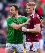 6 July 2019; Darren Coen of Mayo, left, with Sean Andy Ó Ceallaigh of Galway after the GAA Football All-Ireland Senior Championship Round 4 match between Galway and Mayo at the LIT Gaelic Grounds in Limerick. Photo by Brendan Moran/Sportsfile