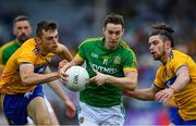 7 July 2019; Bryan McMahon of Meath in action against Cillian Brennan, left, and Cian O'Dea of Clare during the GAA Football All-Ireland Senior Championship Round 4 match between Meath and Clare at O’Moore Park in Portlaoise, Laois. Photo by Piaras Ó Mídheach/Sportsfile