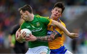 7 July 2019; Bryan McMahon of Meath in action against Aaron Fitzgerald of Clare during the GAA Football All-Ireland Senior Championship Round 4 match between Meath and Clare at O’Moore Park in Portlaoise, Laois. Photo by Piaras Ó Mídheach/Sportsfile