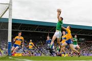 7 July 2019; Mickey Newman of Meath scores his sides second goal despite the efforts of Cillian Brennan of Clare during the GAA Football All-Ireland Senior Championship Round 4 match between Meath and Clare at O’Moore Park in Portlaoise, Laois. Photo by Sam Barnes/Sportsfile