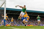 7 July 2019; Mickey Newman of Meath scores his sides second goal despite the efforts of Cillian Brennan of Clare during the GAA Football All-Ireland Senior Championship Round 4 match between Meath and Clare at O’Moore Park in Portlaoise, Laois. Photo by Sam Barnes/Sportsfile