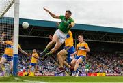 7 July 2019; Mickey Newman of Meath scores his sides second goal despite the efforts of Cillian Brennan of Clare during the GAA Football All-Ireland Senior Championship Round 4 match between Meath and Clare at O’Moore Park in Portlaoise, Laois. Photo by Sam Barnes/Sportsfile