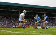 7 July 2019; Aaron Dunphy of Laois shoots to score their side’s first goal, despite the attentions of Darragh O'Connell, right, and Alan Nolan of Dublin during the GAA Hurling All-Ireland Senior Championship preliminary round quarter-final match between Laois and Dublin at O’Moore Park in Portlaoise, Laois. Photo by Sam Barnes/Sportsfile
