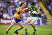 7 July 2019; Ben Brennan of Meath in action against Kevin Hartnett of Clare during the GAA Football All-Ireland Senior Championship Round 4 match between Meath and Clare at O’Moore Park in Portlaoise, Laois. Photo by Sam Barnes/Sportsfile
