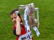 9 July 2019; Sean Conway, five years, from the host club, lifts the Liam MacCarthy Cup at the GAA Hurling All Ireland Senior Championship Series National Launch at Mungret St Pauls GAA Club in Limerick Photo by Ray McManus/Sportsfile