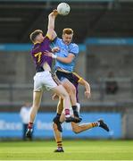 9 July 2019; Kieran Kennedy of Dublin in action against Enda Minouge of Wexford during the EirGrid Leinster GAA Football U20 Championship semi-final match between Dublin and Wexford at Parnell Park in Dublin. Photo by Eóin Noonan/Sportsfile