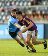 9 July 2019; Dylan McVeigh of Wexford in action against James Doran of Dublin during the EirGrid Leinster GAA Football U20 Championship semi-final match between Dublin and Wexford at Parnell Park in Dublin. Photo by Eóin Noonan/Sportsfile
