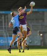 9 July 2019; Liam Coleman of Wexford in action against Donal Ryan of Dublin during the EirGrid Leinster GAA Football U20 Championship semi-final match between Dublin and Wexford at Parnell Park in Dublin. Photo by Eóin Noonan/Sportsfile