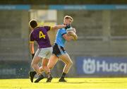 9 July 2019; Kieran Kennedy of Dublin is tackled by Liam O'Connor of Wexford during the EirGrid Leinster GAA Football U20 Championship semi-final match between Dublin and Wexford at Parnell Park in Dublin. Photo by Eóin Noonan/Sportsfile