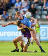 9 July 2019; Liam Coleman of Wexford is tackled by Peadar O'Cofaigh Byrne of Dublin during the EirGrid Leinster GAA Football U20 Championship semi-final match between Dublin and Wexford at Parnell Park in Dublin. Photo by Eóin Noonan/Sportsfile