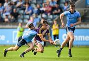 9 July 2019; Liam Coleman of Wexford is tackled by Brian O'Leary of Dublin during the EirGrid Leinster GAA Football U20 Championship semi-final match between Dublin and Wexford at Parnell Park in Dublin. Photo by Eóin Noonan/Sportsfile