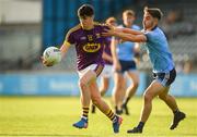 9 July 2019; Micheal Molloy of Wexford in action against Darren Maher of Dublin during the EirGrid Leinster GAA Football U20 Championship semi-final match between Dublin and Wexford at Parnell Park in Dublin. Photo by Eóin Noonan/Sportsfile