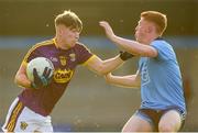 9 July 2019; James Kelly of Wexford in action against Sean Lambe of Dublin during the EirGrid Leinster GAA Football U20 Championship semi-final match between Dublin and Wexford at Parnell Park in Dublin. Photo by Eóin Noonan/Sportsfile