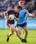 9 July 2019; Jamue Myler of Wexford in action against Eoin O'Dea of Dublin during the EirGrid Leinster GAA Football U20 Championship semi-final match between Dublin and Wexford at Parnell Park in Dublin. Photo by Eóin Noonan/Sportsfile