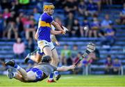 9 July 2019; Conor Bowe of Tipperary scores his side's first goal past Waterford goalkeeper Dean Beecher during the Bord Gáis Energy Munster GAA Hurling Under 20 Championship Semi-Final match between Tipperary and Waterford at Semple Stadium in Thurles, Tipperary. Photo by Piaras Ó Mídheach/Sportsfile