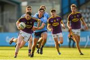 9 July 2019; Enda Minouge of Wexford in action against Niall O'Leary of Dublin during the EirGrid Leinster GAA Football U20 Championship semi-final match between Dublin and Wexford at Parnell Park in Dublin. Photo by Eóin Noonan/Sportsfile