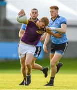 9 July 2019; Michael Kinsella of Wexford in action against Sean Farrelly of Dublin during the EirGrid Leinster GAA Football U20 Championship semi-final match between Dublin and Wexford at Parnell Park in Dublin. Photo by Eóin Noonan/Sportsfile