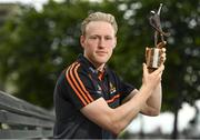 10 July 2019; The PwC GAA/GPA Players of the Month for June, footballer Jamie Brennan of Donegal, and hurler, Diarmuid O’Keeffe of Wexford, were at PwC offices in Dublin today to pick up their respective awards. The players were joined by Billy Sweetman, PwC Wexford, Leinster GAA Chairman, Jim Bolger, and GPA Chief Executive, Paul Flynn. Pictured is Diarmuid O’Keeffe of Wexford with his award at PwC Spencer Dock, North Wall Quay, Dublin 1.  Photo by Sam Barnes/Sportsfile