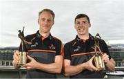 10 July 2019; The PwC GAA/GPA Players of the Month for June, footballer Jamie Brennan of Donegal, and hurler, Diarmuid O’Keeffe of Wexford, were at PwC offices in Dublin today to pick up their respective awards. The players were joined by Billy Sweetman, PwC Wexford, Leinster GAA Chairman, Jim Bolger, and GPA Chief Executive, Paul Flynn. Pictured are Diarmuid O’Keeffe of Wexford. right, and Jamie Brennan of Donegal with their awards at PwC Spencer Dock, North Wall Quay, Dublin 1.  Photo by Sam Barnes/Sportsfile