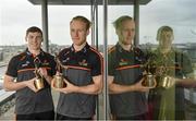 10 July 2019; The PwC GAA/GPA Players of the Month for June, footballer Jamie Brennan of Donegal, and hurler, Diarmuid O’Keeffe of Wexford, were at PwC offices in Dublin today to pick up their respective awards. The players were joined by Billy Sweetman, PwC Wexford, Leinster GAA Chairman, Jim Bolger, and GPA Chief Executive, Paul Flynn. Pictured are Diarmuid O’Keeffe of Wexford. right, and Jamie Brennan of Donegal with their awards at PwC Spencer Dock, North Wall Quay, Dublin 1.  Photo by Sam Barnes/Sportsfile