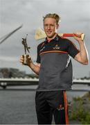 10 July 2019; The PwC GAA/GPA Players of the Month for June, footballer Jamie Brennan of Donegal, and hurler, Diarmuid O’Keeffe of Wexford, were at PwC offices in Dublin today to pick up their respective awards. The players were joined by Billy Sweetman, PwC Wexford, Leinster GAA Chairman, Jim Bolger, and GPA Chief Executive, Paul Flynn. Pictured is Diarmuid O’Keeffe of Wexford with his award at PwC Spencer Dock, North Wall Quay, Dublin 1.  Photo by Sam Barnes/Sportsfile