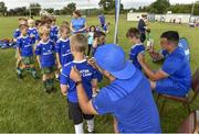 10 July 2019; Leinster players Jamison Gibson Park and Ronan Kelleher with participants during the Bank of Ireland Leinster Rugby Summer Camp at Greystones RFC in Greysrones, Wicklow. Photo by Matt Browne/Sportsfile