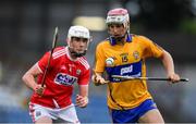 10 July 2019; Breffni Horner of Clare in action against Eoin Roche of Cork during the Bord Gais Energy Munster GAA Hurling Under 20 Championship semi-final match between Cork and Clare at Páirc Ui Rinn in Cork. Photo by Brendan Moran/Sportsfile