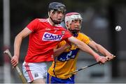 10 July 2019; Robert Downey of Cork in action against Breffni Horner of Clare during the Bord Gais Energy Munster GAA Hurling Under 20 Championship semi-final match between Cork and Clare at Páirc Ui Rinn in Cork. Photo by Brendan Moran/Sportsfile