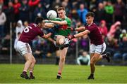 10 July 2019; John Gallagher of Mayo in action against Ciarán Potter, left, and Ross Mahon of Galway during the EirGrid Connacht GAA Football U20 Championship final match between Galway and Mayo at Tuam, Co. Galway. Photo by Sam Barnes/Sportsfile