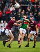 10 July 2019; John Gallagher of Mayo in action against Ciarán Potter, left, and Ross Mahon of Galway during the EirGrid Connacht GAA Football U20 Championship final match between Galway and Mayo at Tuam, Co. Galway. Photo by Sam Barnes/Sportsfile
