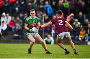 10 July 2019; John Gallagher of Mayo in action against Ross Mahon of Galway during the EirGrid Connacht GAA Football U20 Championship final match between Galway and Mayo at Tuam, Co. Galway. Photo by Sam Barnes/Sportsfile