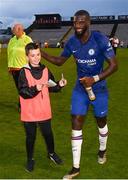 10 July 2019; Tiemoue Bakayoko of Chelsea signs an autograph for a ballboy following a friendly match between Bohemians and Chelsea at Dalymount Park in Dublin. Photo by Ramsey Cardy/Sportsfile