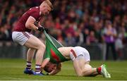 6 July 2019; Colm Boyle of Mayo with Sean Andy Ó Ceallaigh of Galway during the GAA Football All-Ireland Senior Championship Round 4 match between Galway and Mayo at the LIT Gaelic Grounds in Limerick. Photo by Brendan Moran/Sportsfile