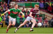 6 July 2019; Peter Cooke of Galway in action against Donal Vaughan of Mayo during the GAA Football All-Ireland Senior Championship Round 4 match between Galway and Mayo at the LIT Gaelic Grounds in Limerick. Photo by Brendan Moran/Sportsfile