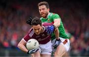 6 July 2019; Ian Burke of Galway in action against Chris Barrett of Mayo during the GAA Football All-Ireland Senior Championship Round 4 match between Galway and Mayo at the LIT Gaelic Grounds in Limerick. Photo by Brendan Moran/Sportsfile