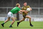 11 July 2019; Seán O'Leary of Kerry is tackled by Dubhán O'Grady of Limerick during the EirGrid GAA Football Under 20 Munster Championship Semi-Final match between Kerry and Limerick at Austin Stack Park in Tralee, Kerry. Photo by Brendan Moran/Sportsfile