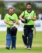 12 June 2019; Paul Stirling and Andrew Balbirnie of Ireland come off after winning the 2nd T20 Cricket International match between Ireland and Zimbabwe at Bready Cricket Club in Magheramason, Co. Tyrone. Photo by Oliver McVeigh/Sportsfile