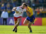 13 July 2019; Niall Sludden of Tyrone is tackled by Cathal Cregg of Roscommon during the GAA Football All-Ireland Senior Championship Quarter-Final Group 2 Phase 1 match between Roscommon and Tyrone at Dr Hyde Park in Roscommon. Photo by Brendan Moran/Sportsfile