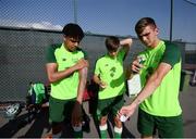 13 July 2019; Republic of Ireland players, from left, Andrew Omobamidele, Niall Morahan and Oisin McEntee apply suncream ahead of a training session prior to the start of the 2019 UEFA European U19 Championships at the FFA Technical Centre in Yerevan, Armenia. Photo by Stephen McCarthy/Sportsfile