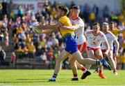 13 July 2019; Shane Killoran of Roscommon is tackled by Richie Donnelly of Tyrone during the GAA Football All-Ireland Senior Championship Quarter-Final Group 2 Phase 1 match between Roscommon and Tyrone at Dr Hyde Park in Roscommon. Photo by Brendan Moran/Sportsfile