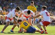 13 July 2019; Tadgh O'Rourke of Roscommon under pressure from Tyrone players Michael McKernan, Padraig Hampsey and Kieran McGeary during the GAA Football All-Ireland Senior Championship Quarter-Final Group 2 Phase 1 match between Roscommon and Tyrone at Dr Hyde Park in Roscommon. Photo by Brendan Moran/Sportsfile